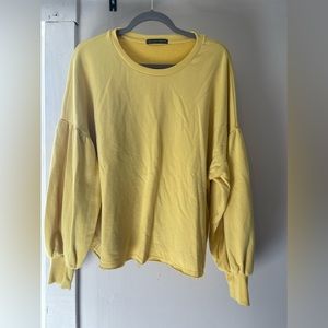 Yellow pullover sweater
